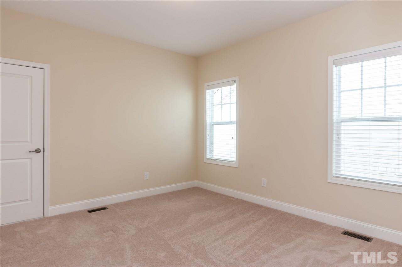 1553 Fullerton Place Raleigh, NC 27607 - Photo 20 of 25 an empty room with a window