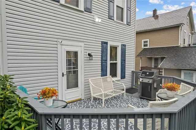 a bathroom with a bathtub and window