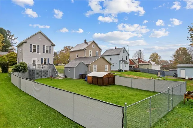 an aerial view of a house with a garden