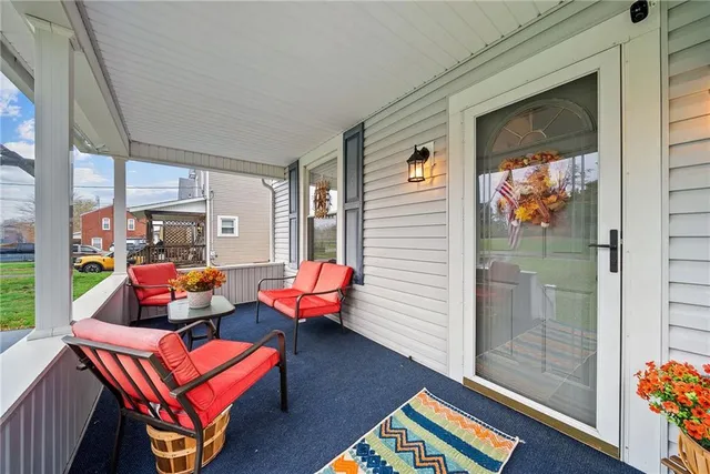 a outdoor living space with patio furniture and a potted plant