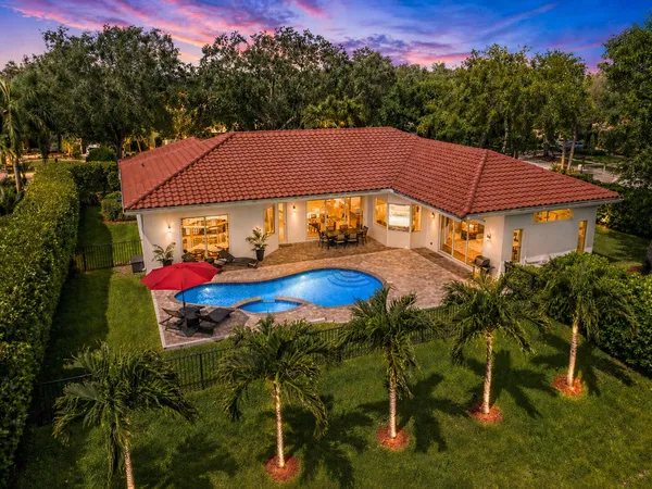 a view of a house with swimming pool