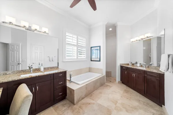 a bathroom with a bathtub and a toilet