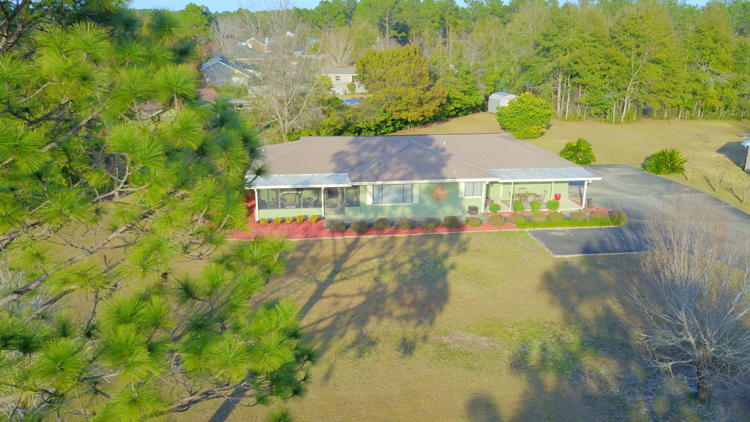 495 Ridge Lake Road Crestview, FL 32536 - Photo 2 of 26 a view of outdoor space and yard
