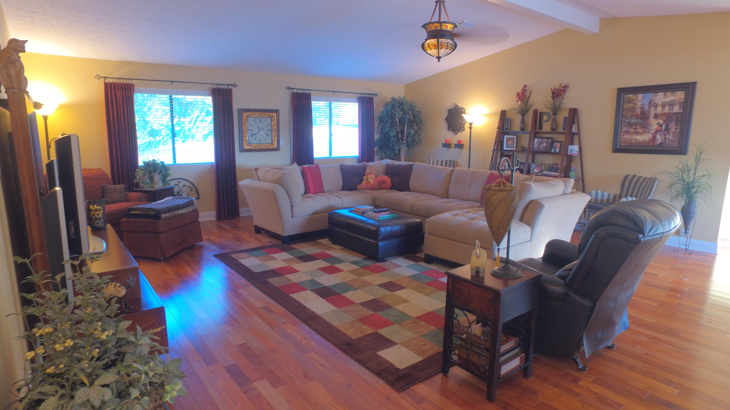 495 Ridge Lake Road Crestview, FL 32536 - Photo 12 of 26 a living room with furniture fireplace and a window