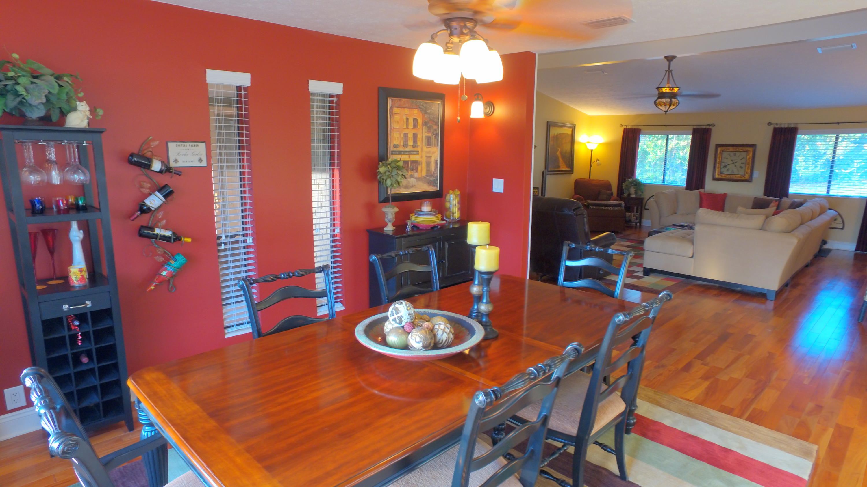 495 Ridge Lake Road Crestview, FL 32536 - Photo 16 of 26 a dining room with furniture and wooden floor