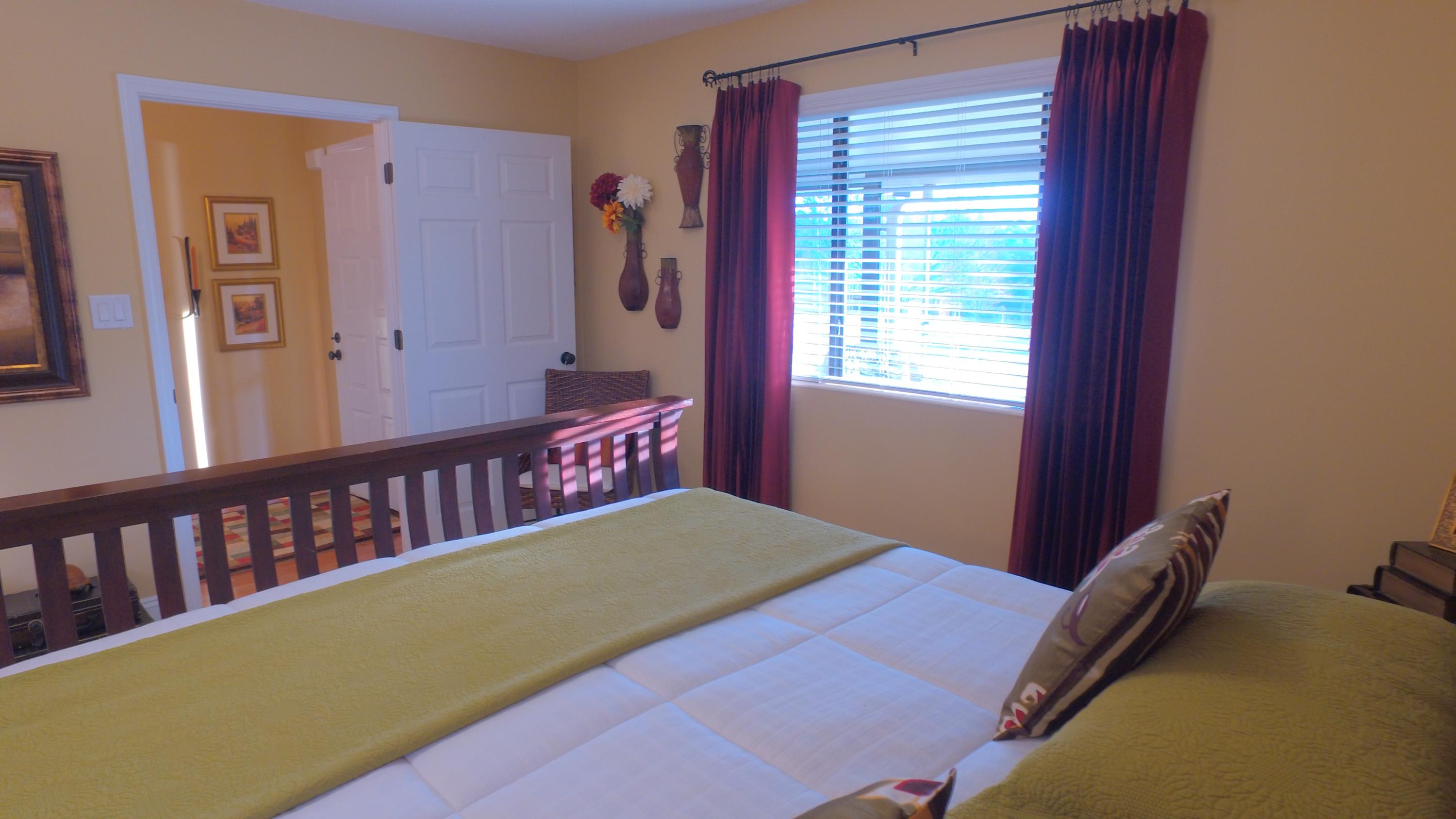 495 Ridge Lake Road Crestview, FL 32536 - Photo 19 of 26 a bedroom with a bed and a window