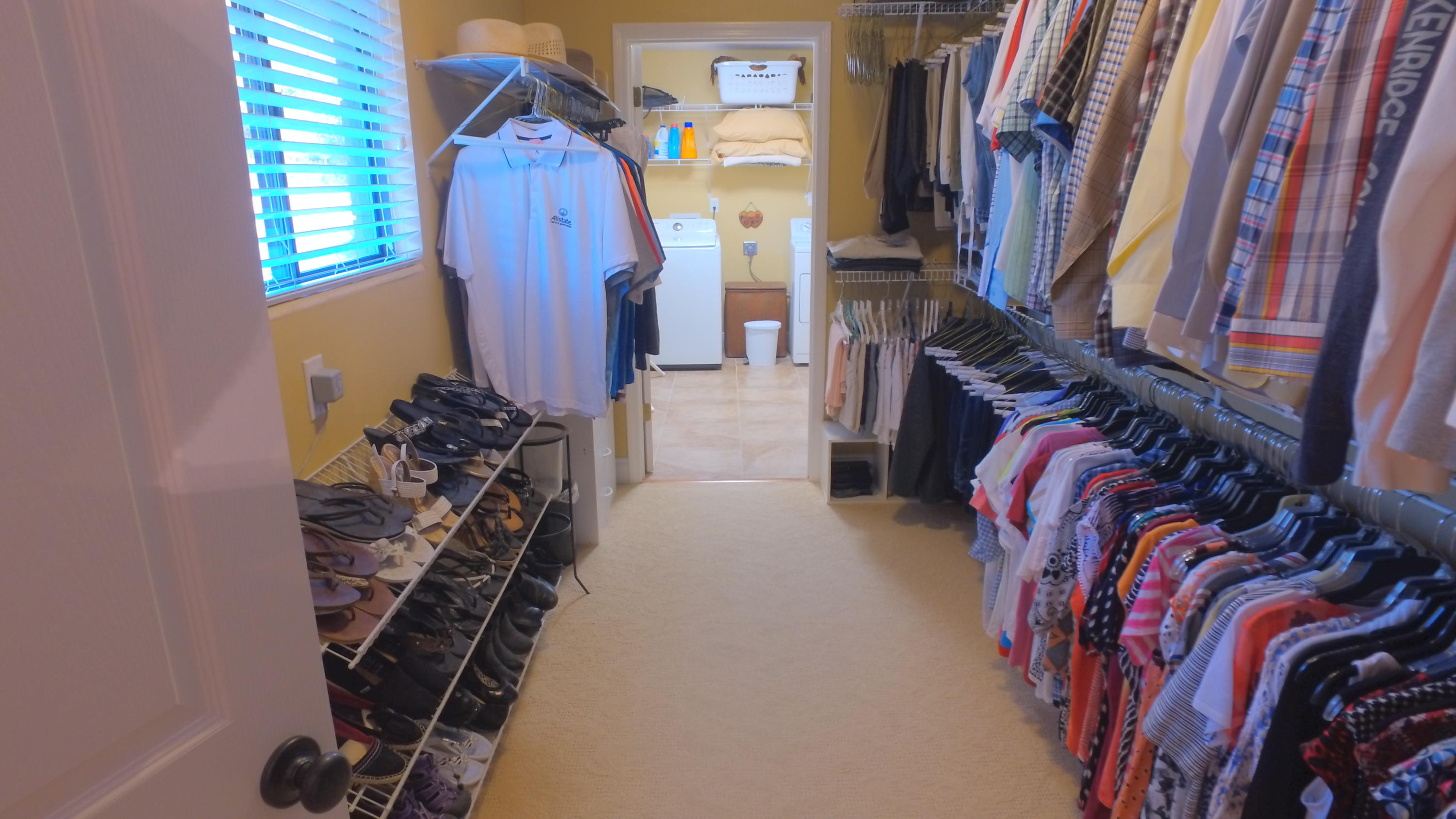 495 Ridge Lake Road Crestview, FL 32536 - Photo 23 of 26 a view of walk in closet with clothes
