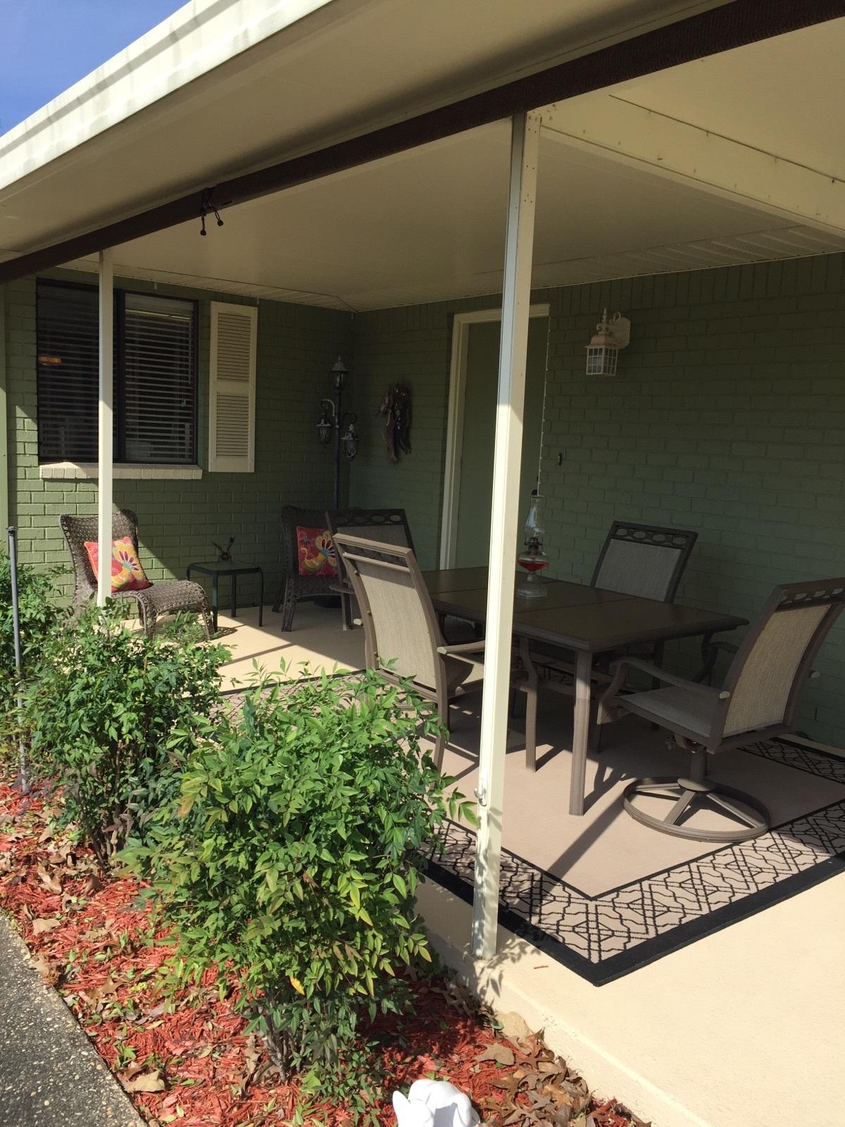 495 Ridge Lake Road Crestview, FL 32536 - Photo 10 of 26 a front view of a house with chairs