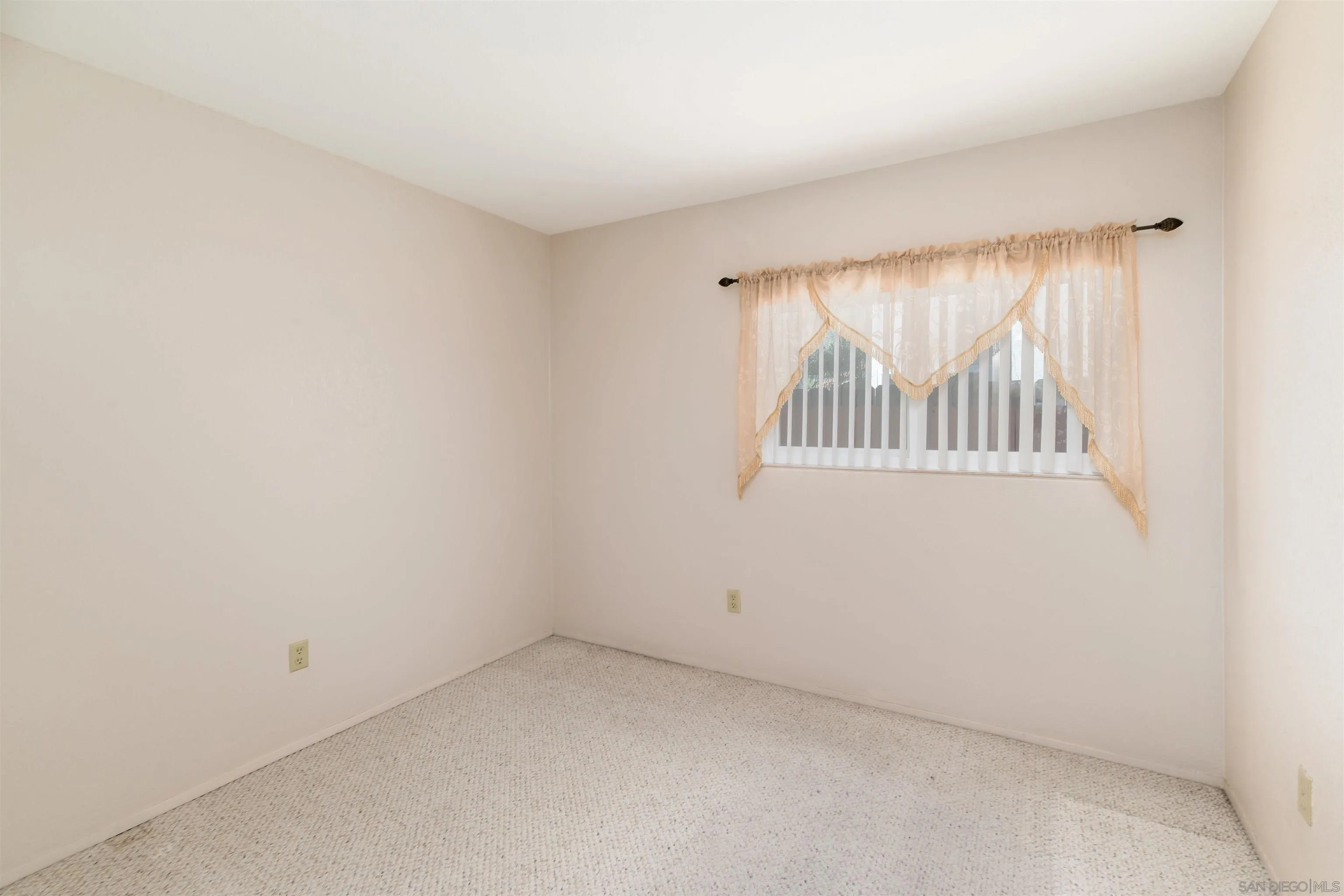 12810 Cochera Road Lakeside, CA 92040 - Photo 14 of 19 an empty room with windows