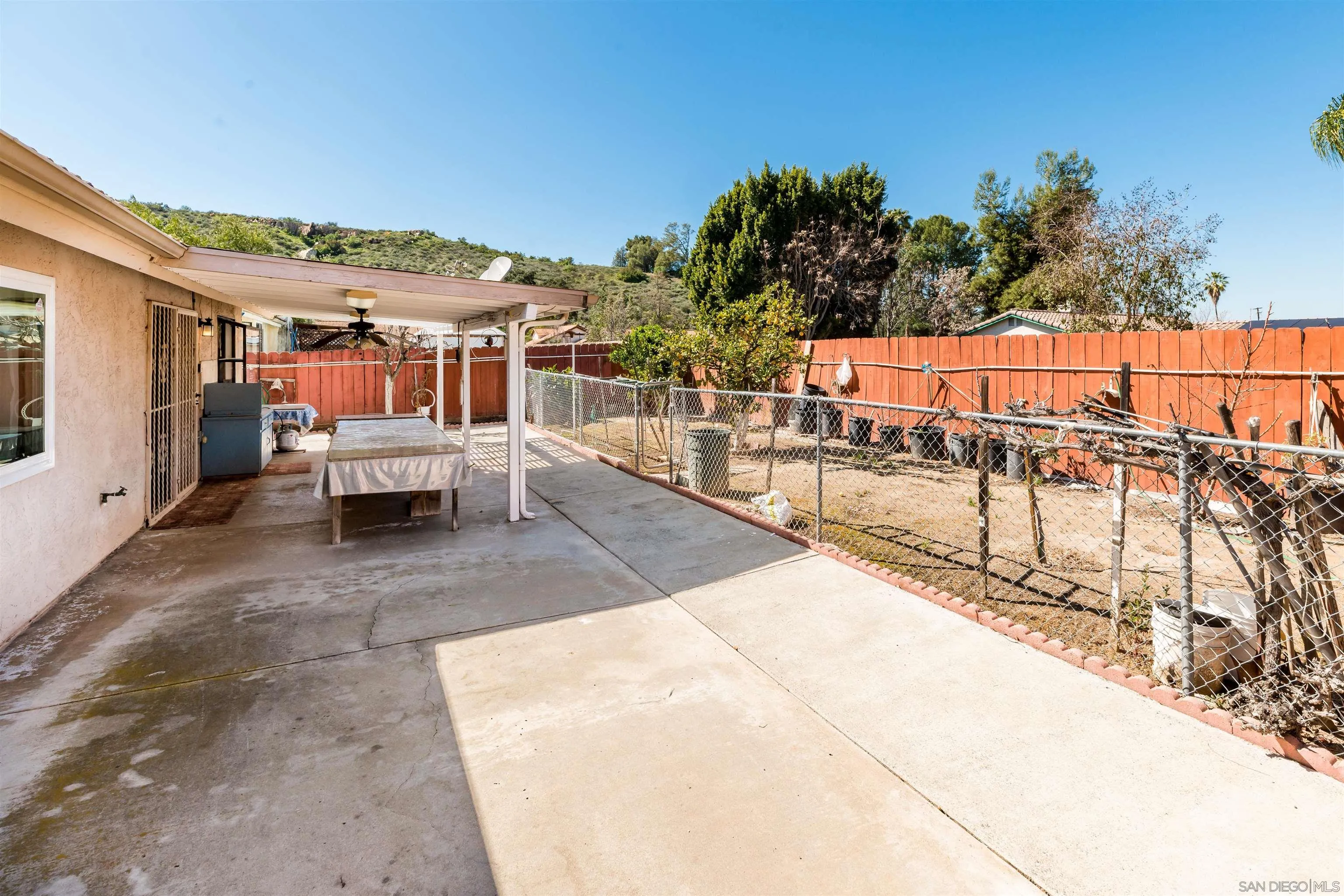 12810 Cochera Road Lakeside, CA 92040 - Photo 19 of 19 a view of a swimming pool with a patio