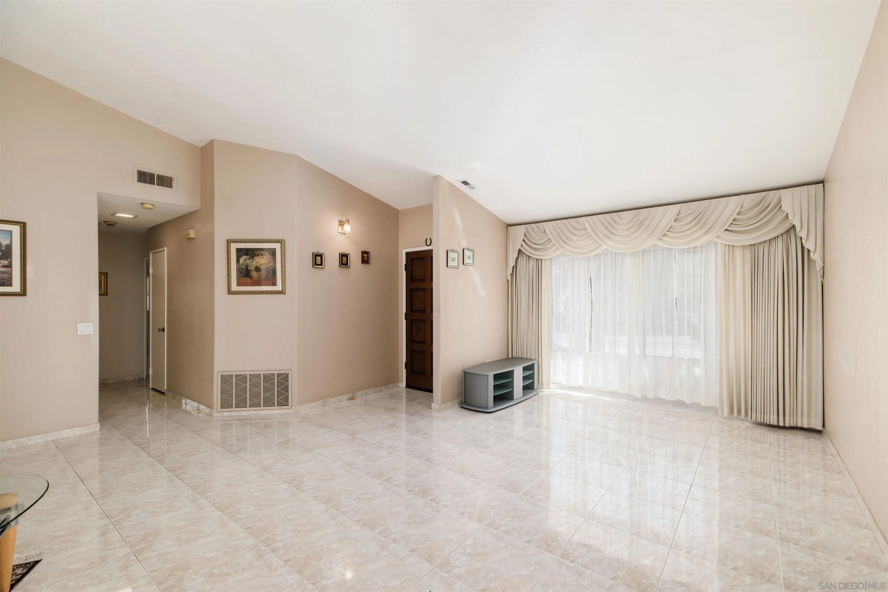 12810 Cochera Road Lakeside, CA 92040 - Photo 4 of 19 a view of an empty room with a window