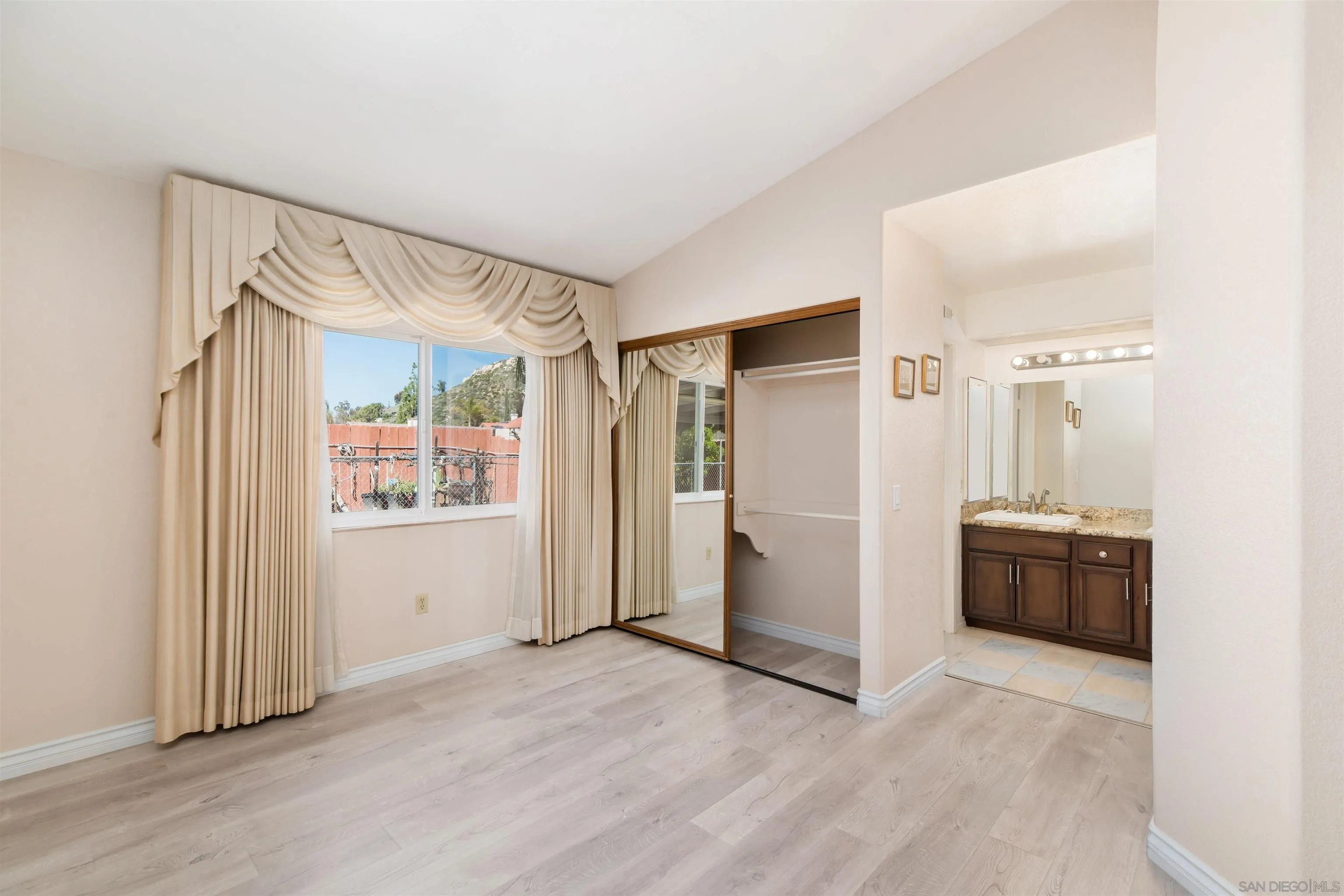 12810 Cochera Road Lakeside, CA 92040 - Photo 10 of 19 a view of an empty room and window