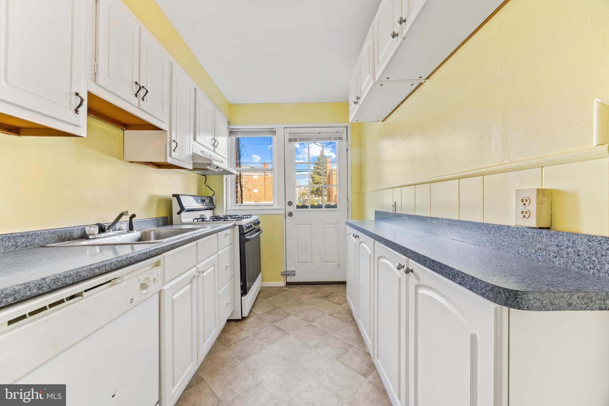 7310 Kirtley Road Baltimore, MD 21224 - Photo 11 of 31 a kitchen with sink and cabinets