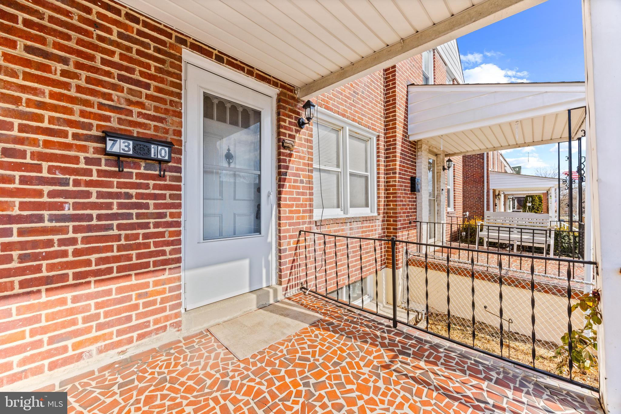 7310 Kirtley Road Baltimore, MD 21224 - Photo 2 of 31 a view of a balcony with a potted plant