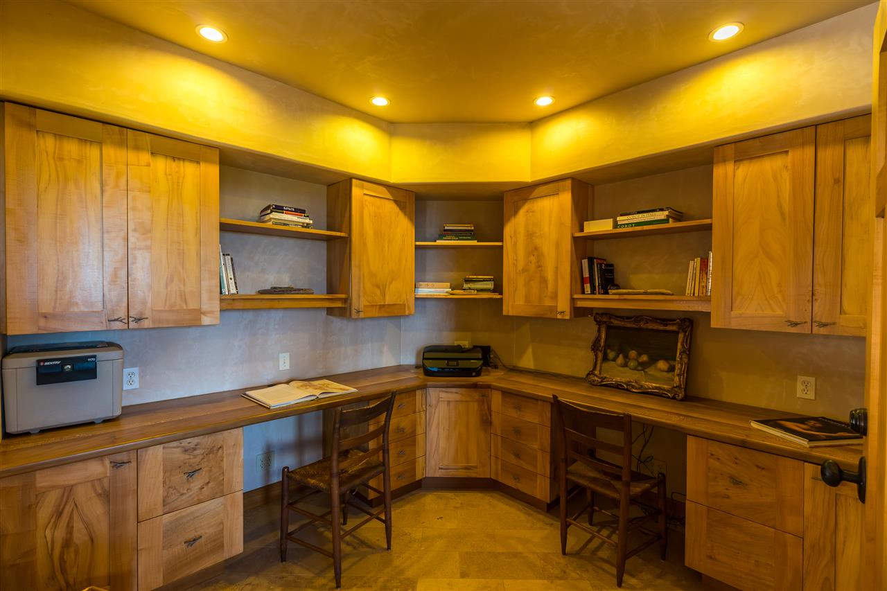 770 North Honokala Road, Unit A Haiku, HI 96708 - Photo 11 of 30 a kitchen with a sink appliances cabinets and furniture