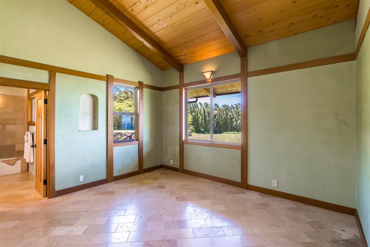 770 North Honokala Road, Unit A Haiku, HI 96708 - Photo 17 of 30 an empty room with windows