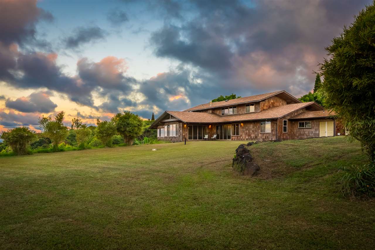 770 North Honokala Road, Unit A Haiku, HI 96708 - Photo 28 of 30 a front view of a house with a garden