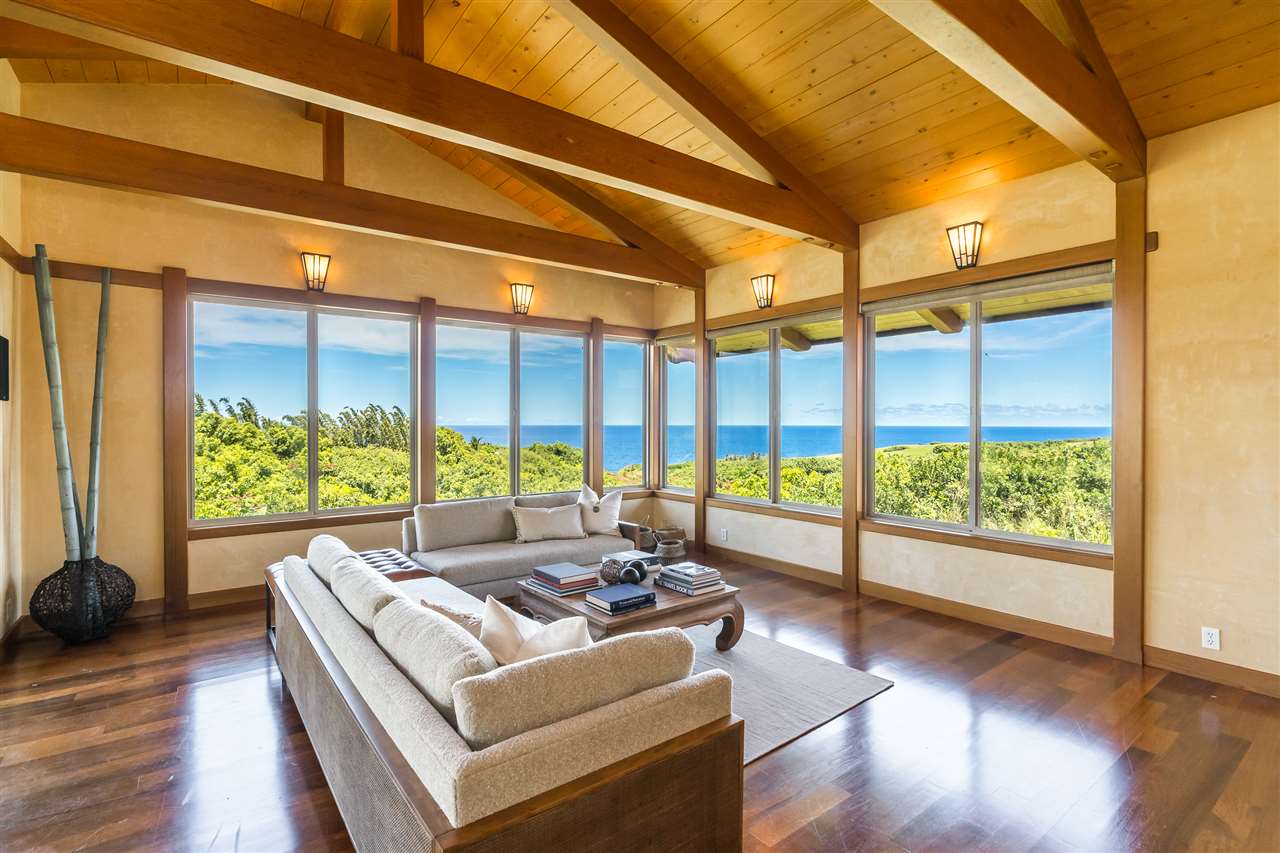 770 North Honokala Road, Unit A Haiku, HI 96708 - Photo 9 of 30 a living room with furniture and a large window