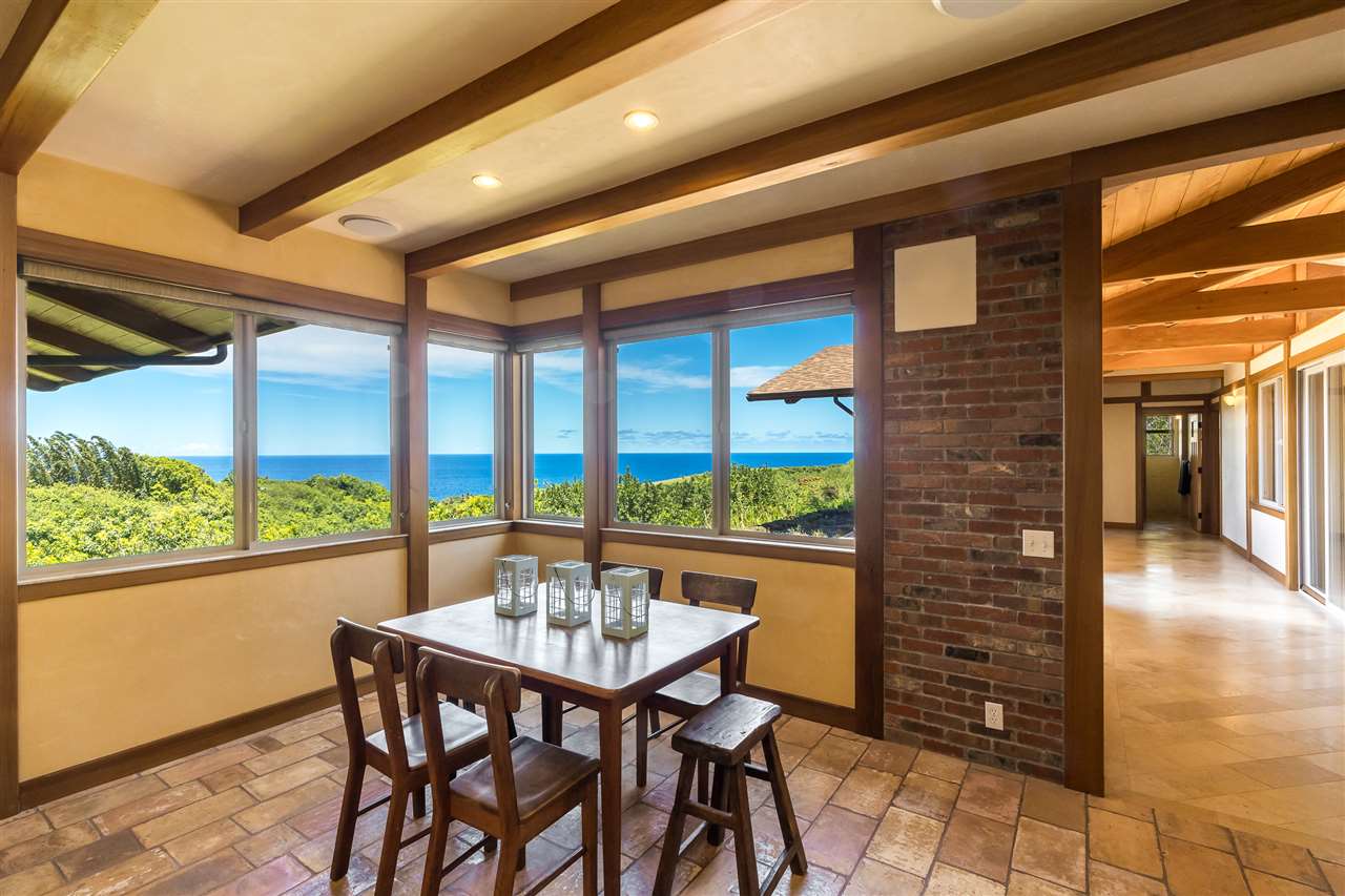 770 North Honokala Road, Unit A Haiku, HI 96708 - Photo 10 of 30 a view of a dining room with furniture and window