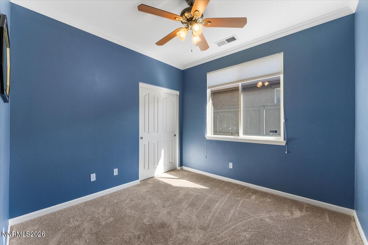 441 Miesque Court Reno, NV 89521 - Photo 22 of 41 Bed 2 with crown moulding & new carpet