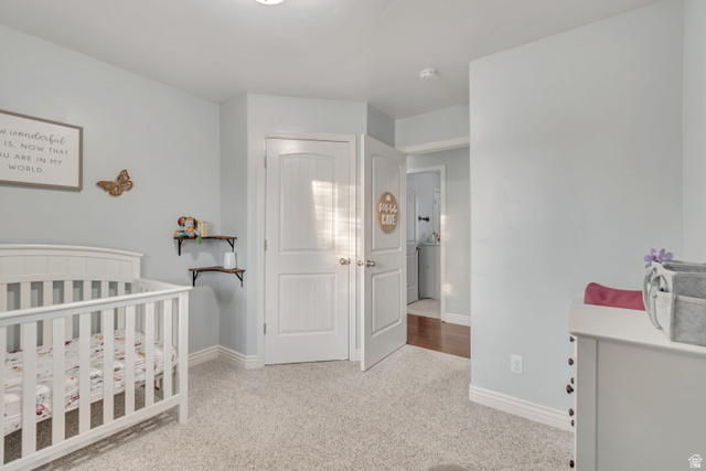 356 North 230 West Payson, UT 84651 - Photo 16 of 45 Carpeted room with light blue wall paint, white trim, and a white paneled door