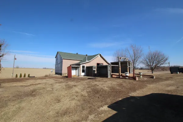 a big room with a big yard and large trees
