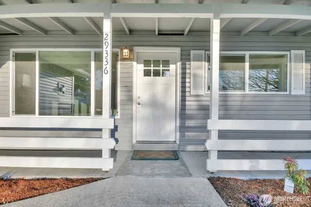a view of entrance gate of a house