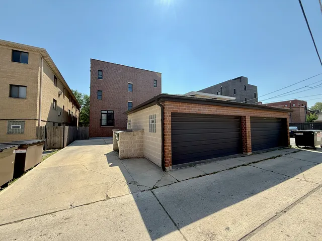 a view of a house with a garage