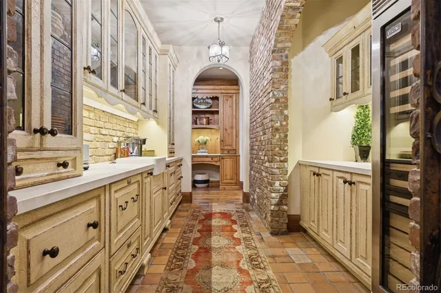 a bathroom with a sink a toilet and a shower