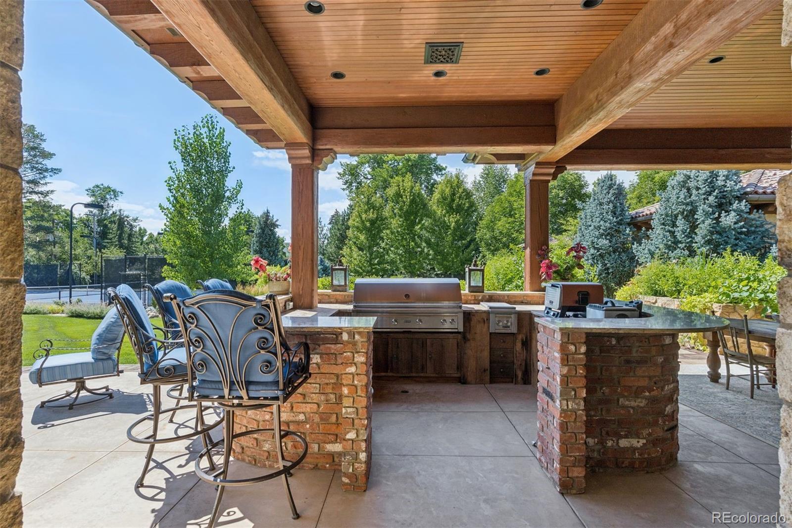 7 Village Road Cherry Hills Village, CO 80113 - Photo 21 of 50 a view of a patio with chairs and backyard