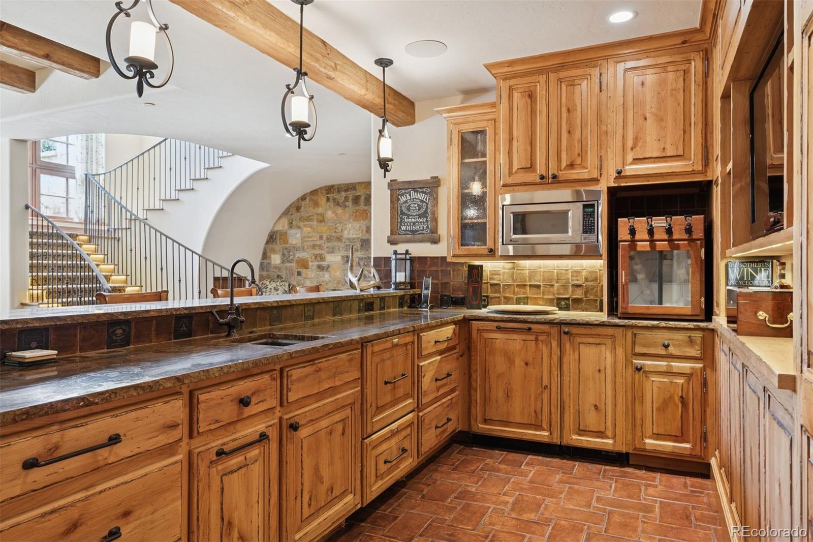 7 Village Road Cherry Hills Village, CO 80113 - Photo 40 of 50 a kitchen with stainless steel appliances granite countertop a sink and cabinets