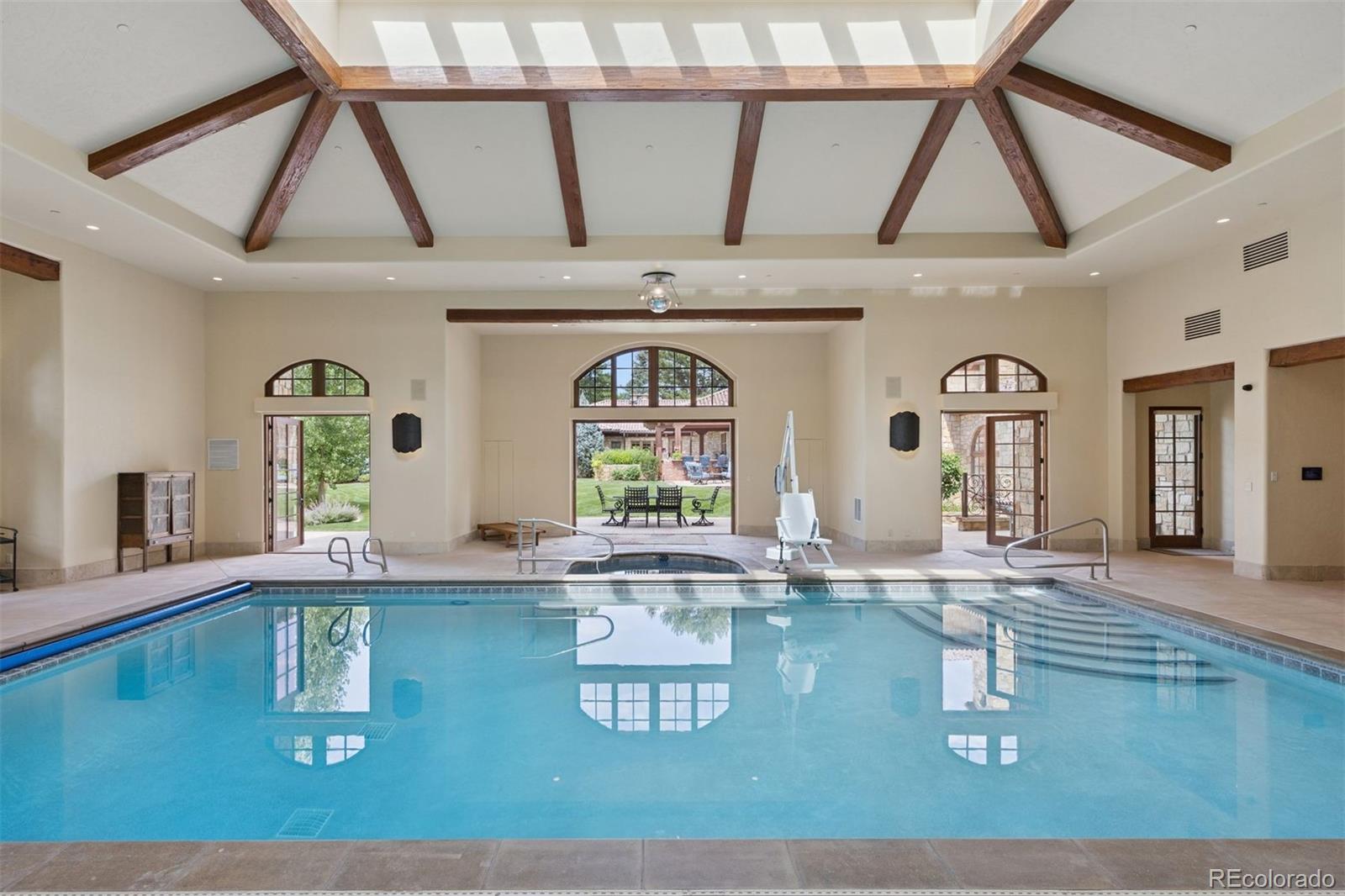 7 Village Road Cherry Hills Village, CO 80113 - Photo 47 of 50 a view of living room with kitchen island furniture and window