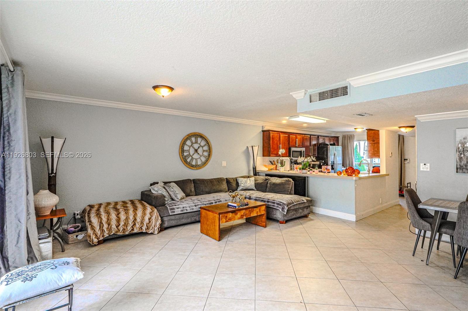 3331 Farragut Street, Unit 8A Hollywood, FL 33021 - Photo 17 of 26 a living room with furniture and a area