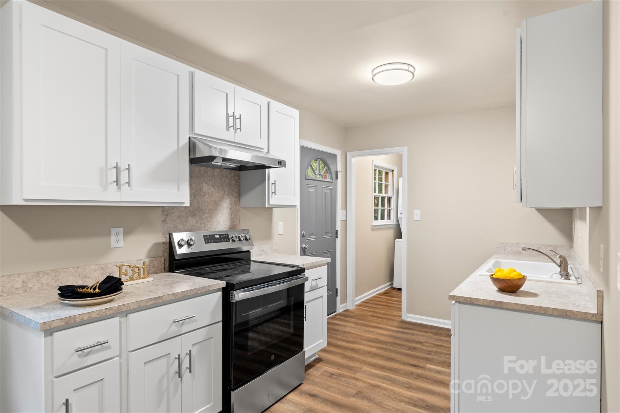 315 High Street Rock Hill, SC 29730 - Photo 13 of 33 a kitchen with stainless steel appliances granite countertop a sink stove and cabinets