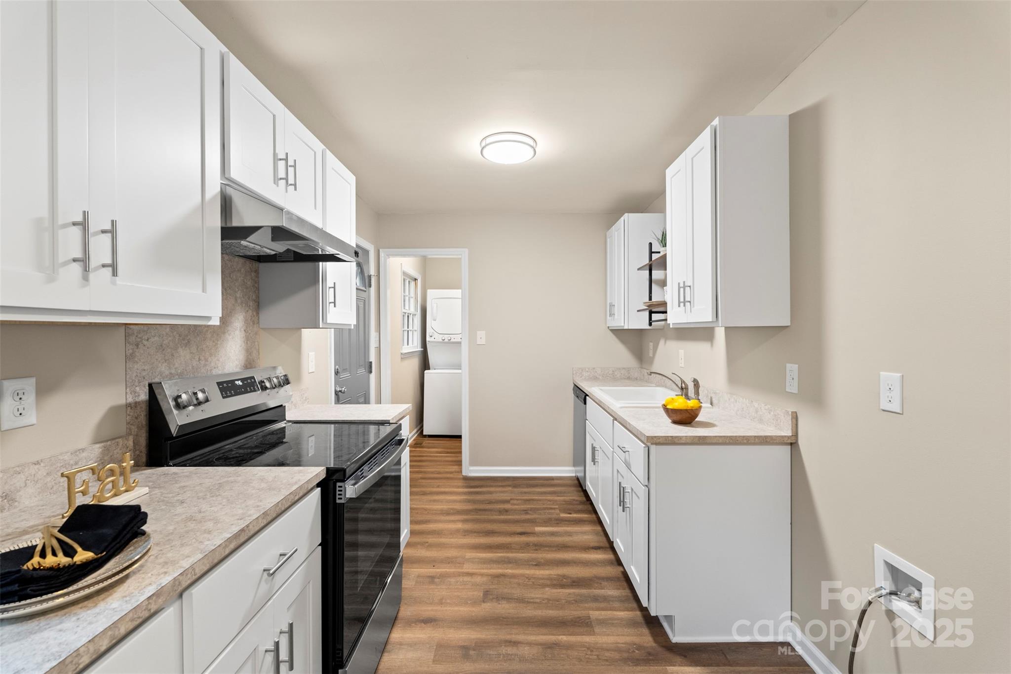 315 High Street Rock Hill, SC 29730 - Photo 14 of 33 a kitchen with stainless steel appliances a sink stove and cabinets