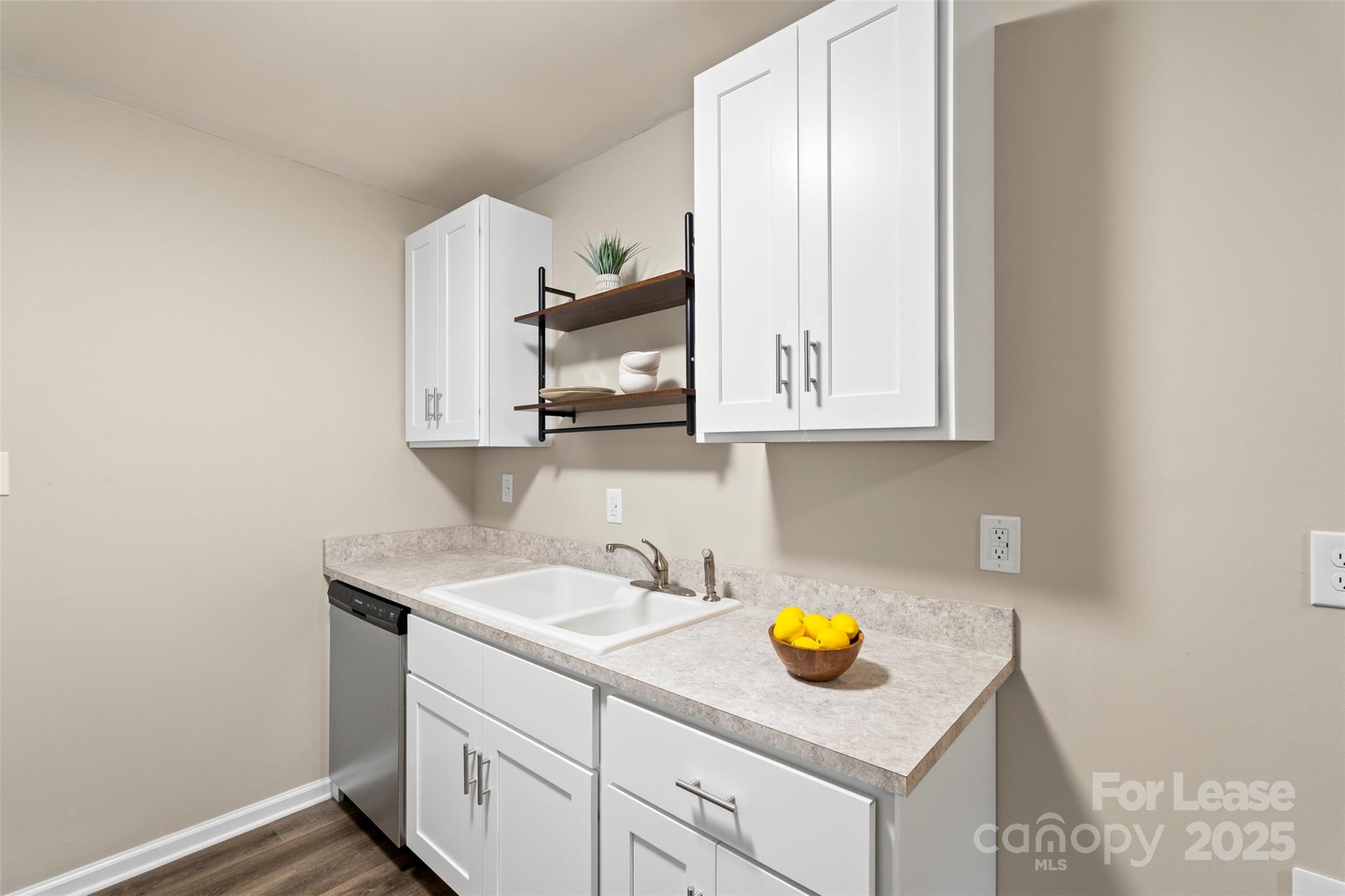 315 High Street Rock Hill, SC 29730 - Photo 15 of 33 a kitchen with a sink a stove and cabinets