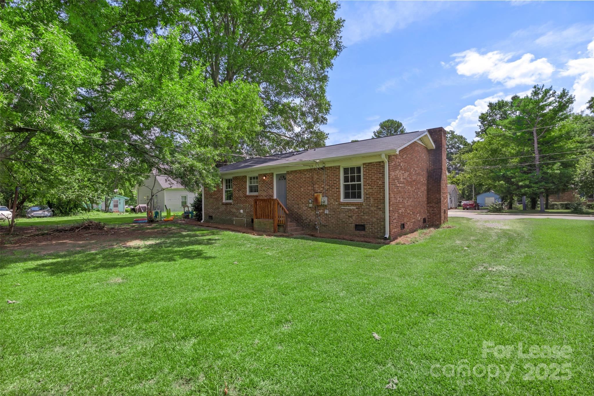 315 High Street Rock Hill, SC 29730 - Photo 28 of 33 a view of a backyard with large trees