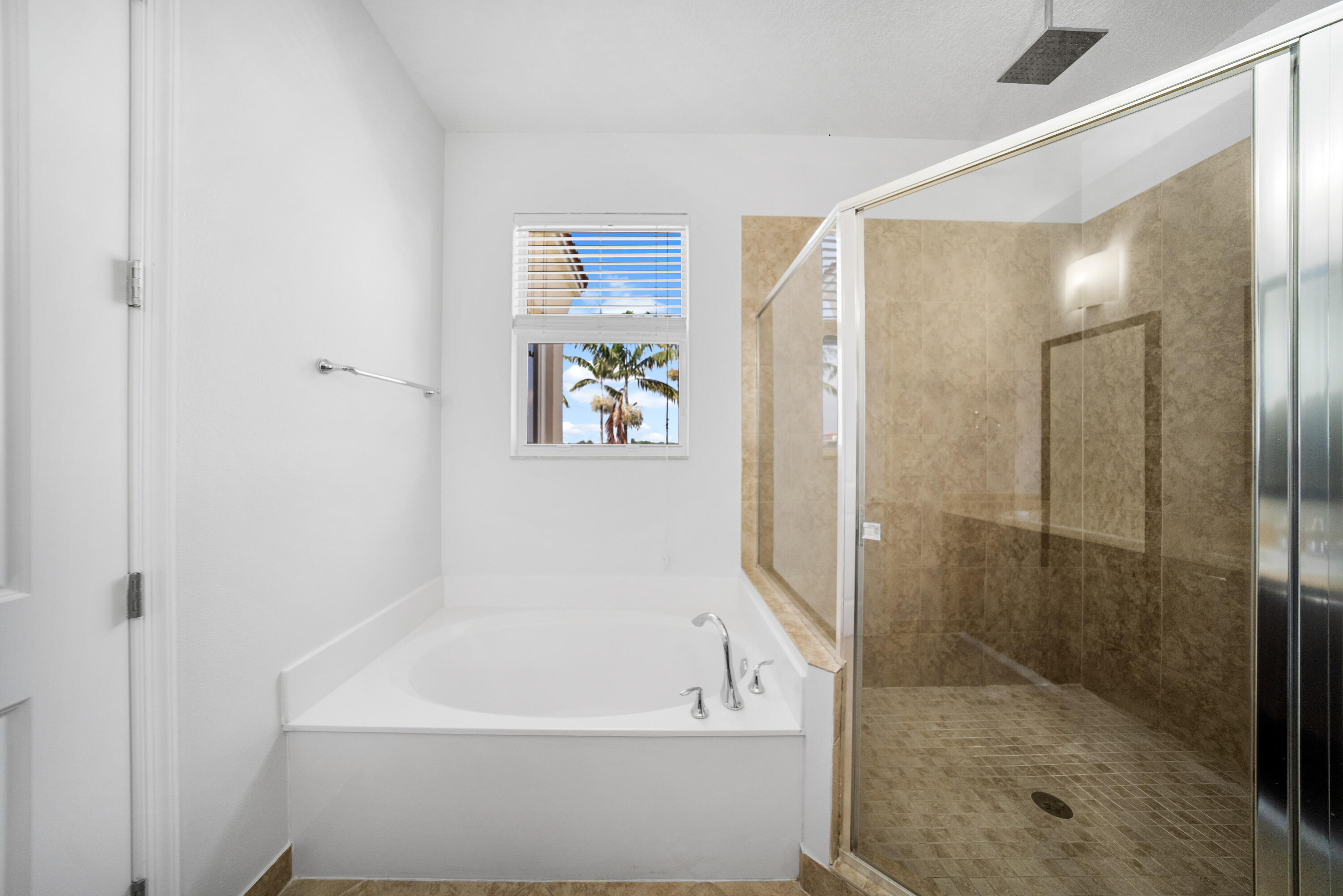 1430 Northwest 48th Lane Boca Raton, FL 33431 - Photo 23 of 54 a bathroom with a bathtub and a shower