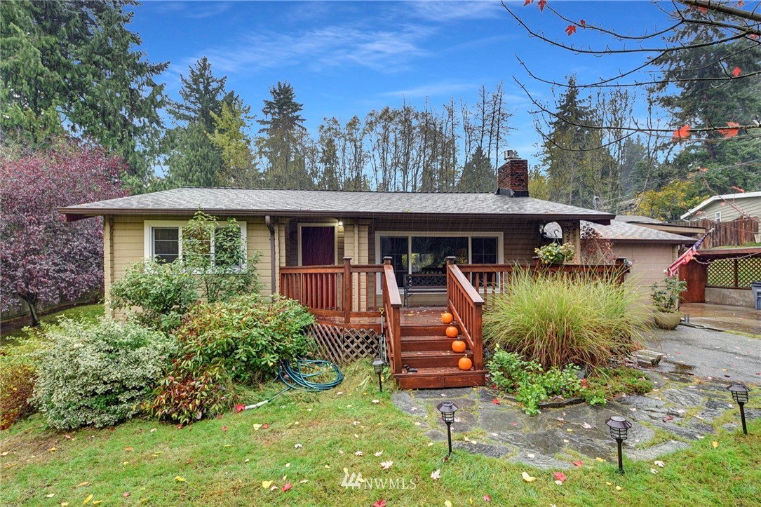 527 240th Street Southwest Bothell, WA 98021 - Photo 1 of 32 a front view of a house with a yard