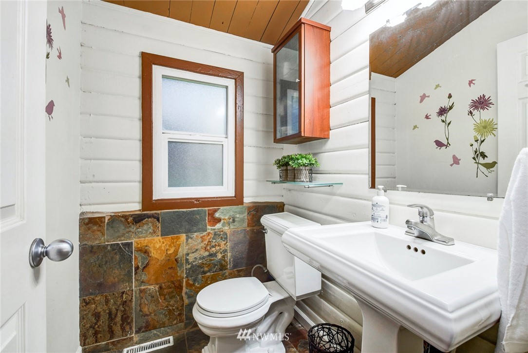 527 240th Street Southwest Bothell, WA 98021 - Photo 12 of 32 a bathroom with a sink toilet and shower