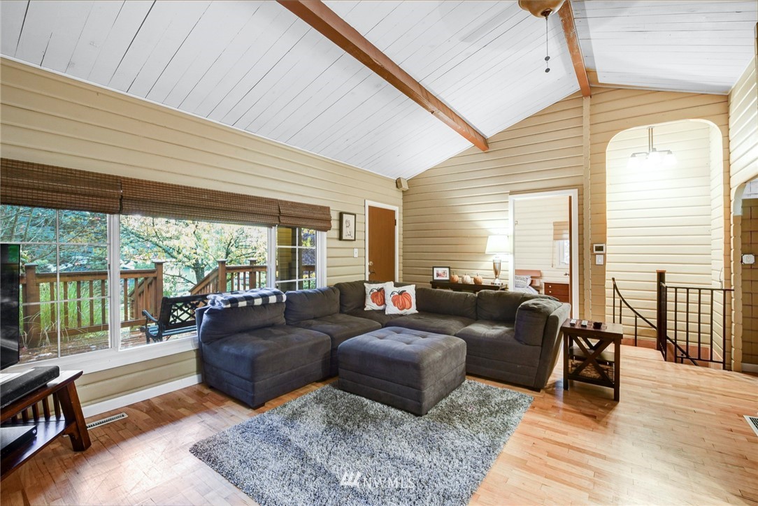 527 240th Street Southwest Bothell, WA 98021 - Photo 6 of 32 a living room with furniture and a large window