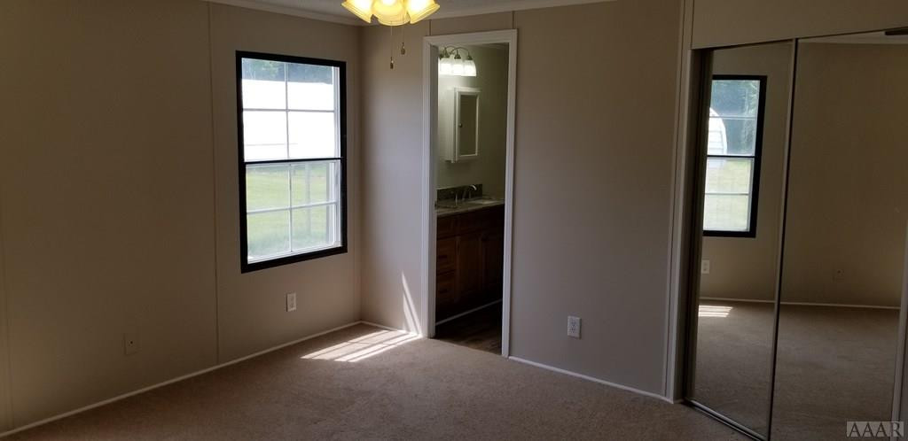 1089 Commissary Road Elizabeth City, NC 27909 - Photo 11 of 19 Master Bedroom and Bath
