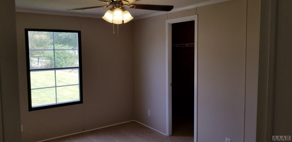 1089 Commissary Road Elizabeth City, NC 27909 - Photo 14 of 19 Second Bedroom with walk in closet