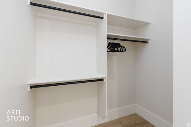 1188 South Old Trappers Loop Road Huntsville, UT 84317 - Photo 38 of 92 Built-in closet system featuring white shelving and black hanging rods