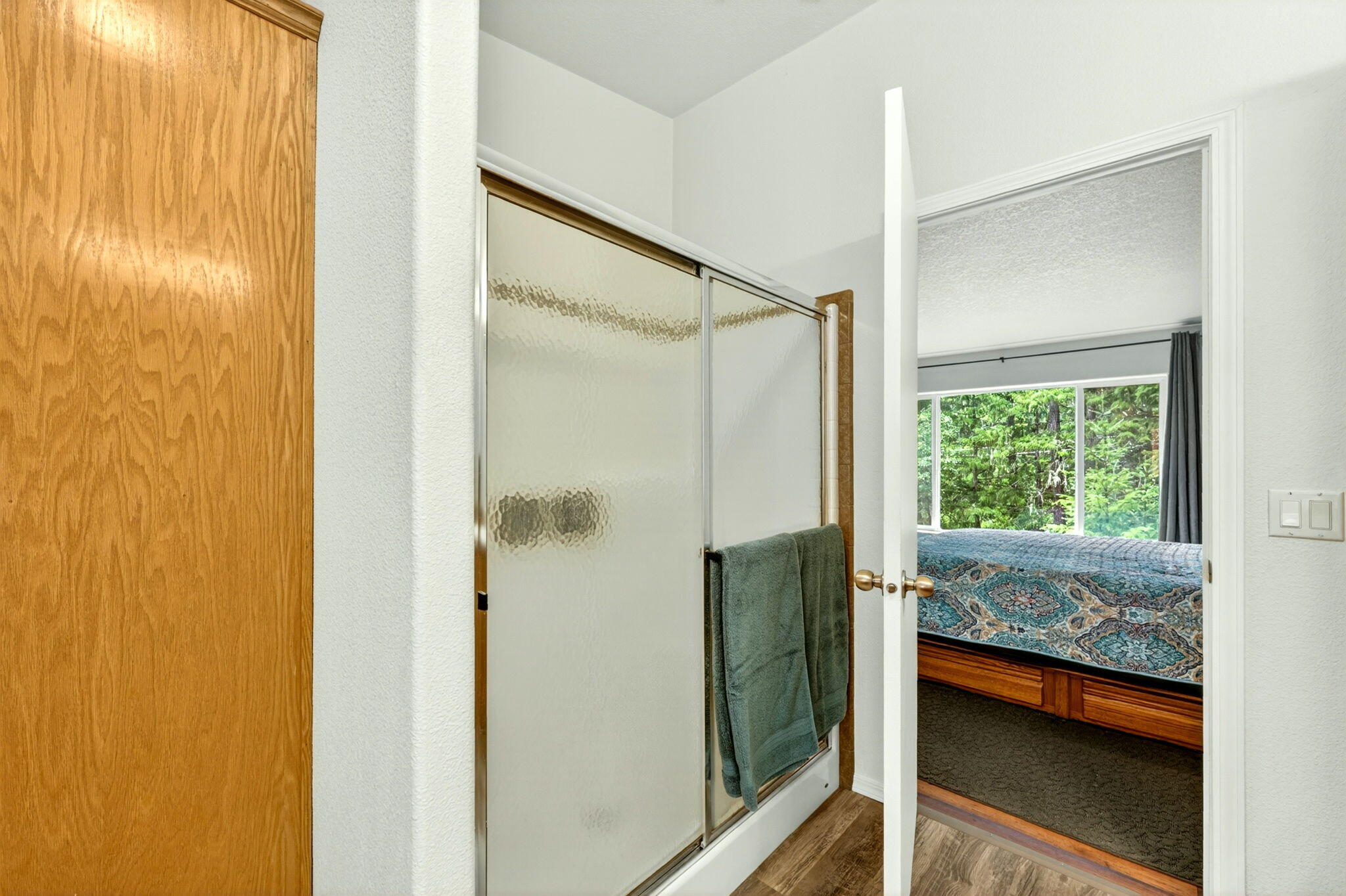 5445 Thompson Creek Road Selma, OR 97538 - Photo 29 of 57 a bathroom with a tub and a shower