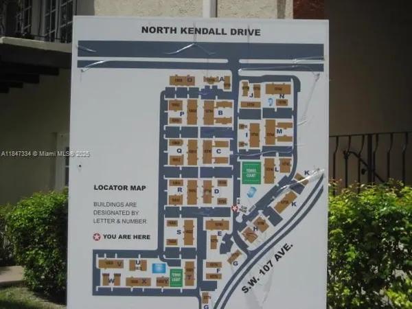 a front view of a building with a street