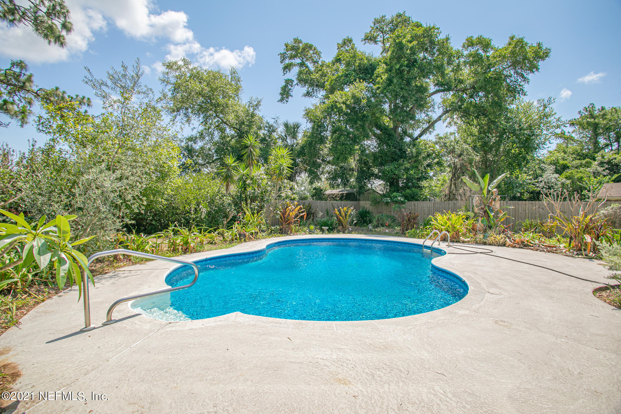 a view of outdoor space yard swimming pool and patio