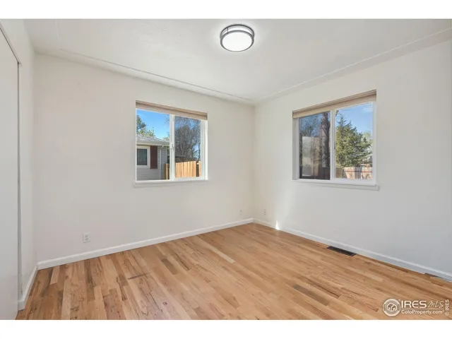 a bathroom with a shower and a toilet
