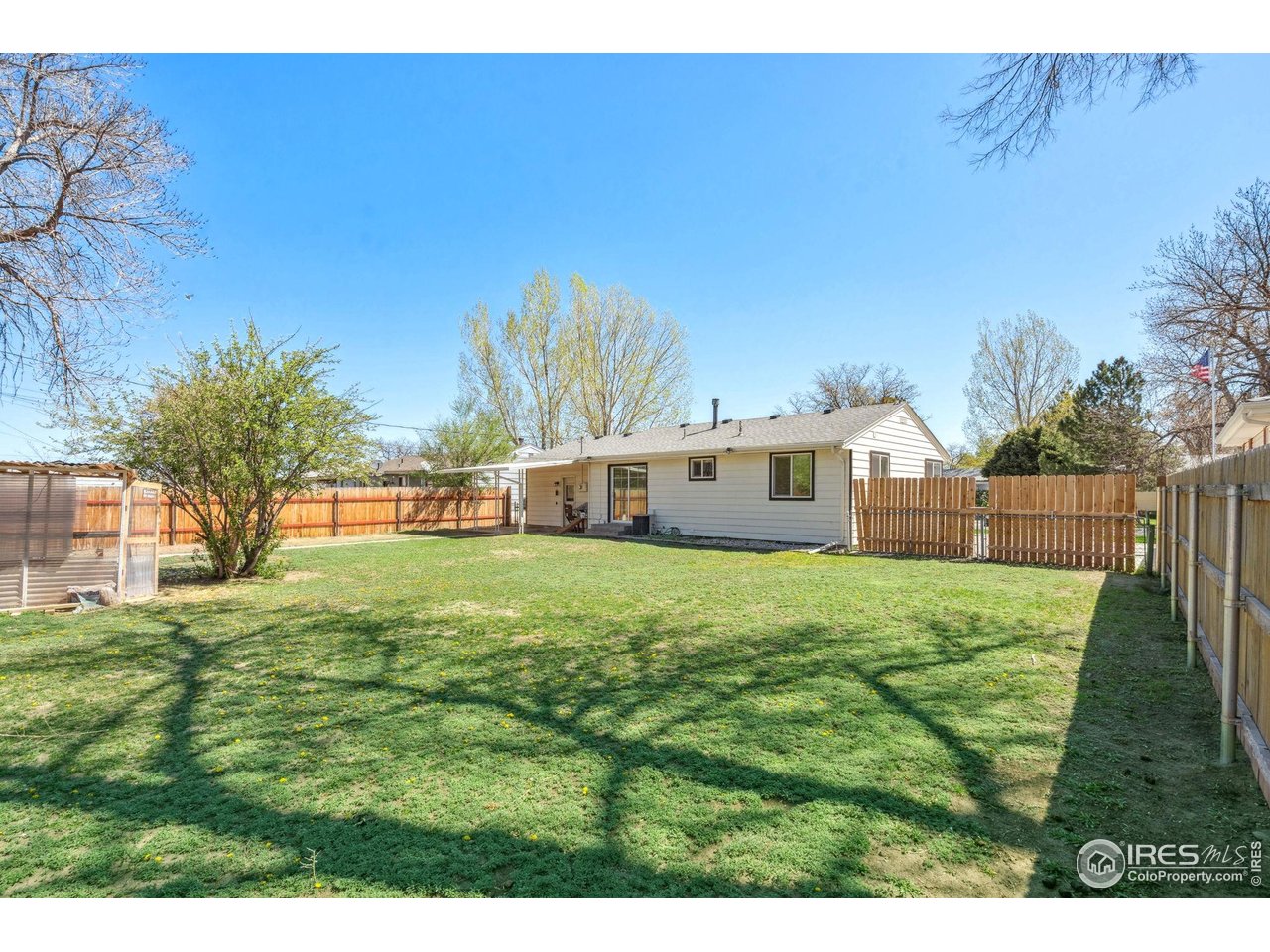113 Balsam Street Fort Morgan, CO 80701 - Photo 27 of 30 a view of a yard in front of a house