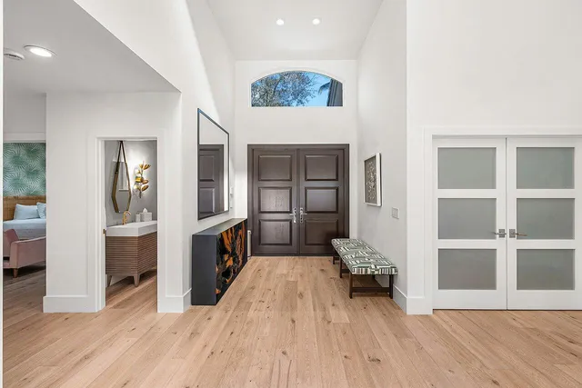 an aerial view of residential house with outdoor space and lake view